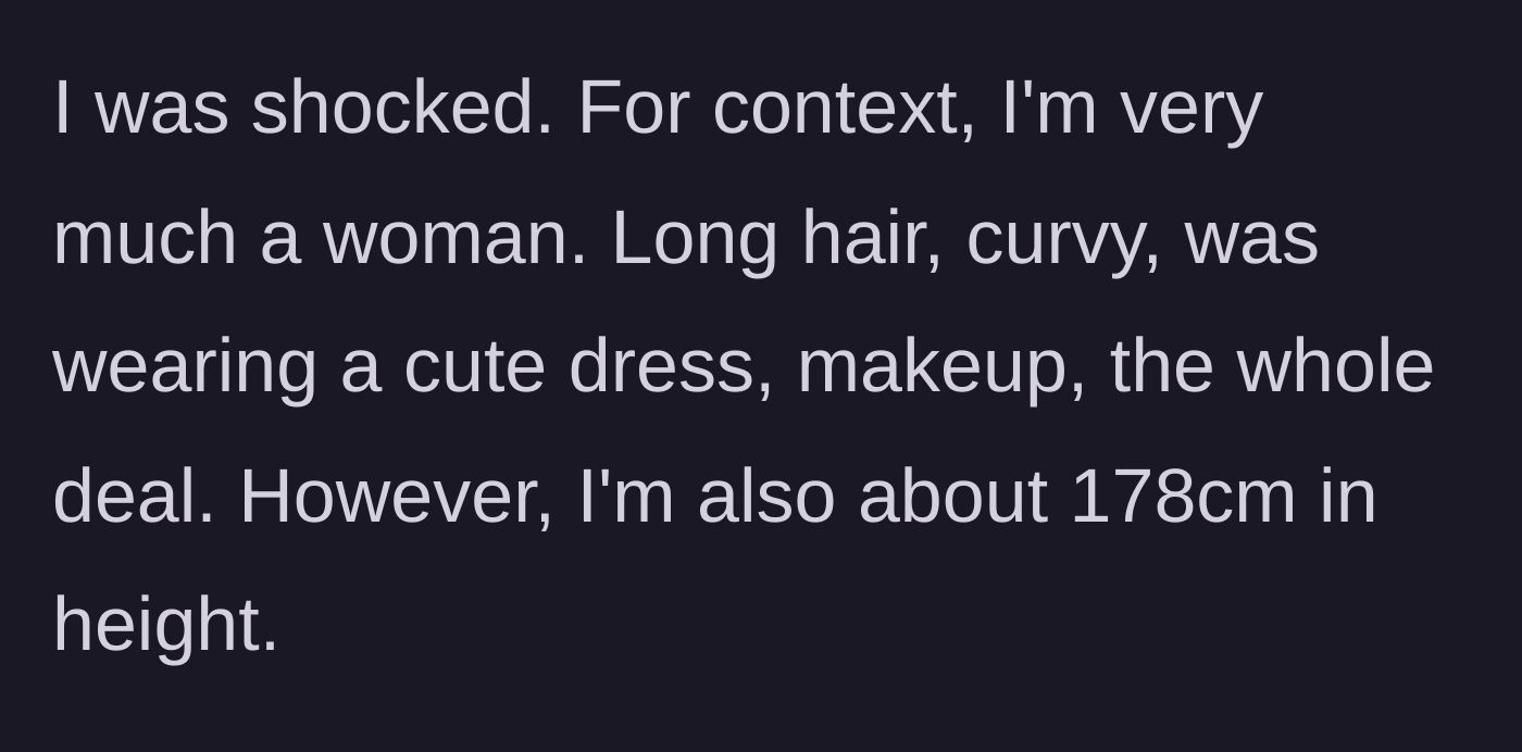 Story part 2 - The author describes her feminine appearance and above-average height.